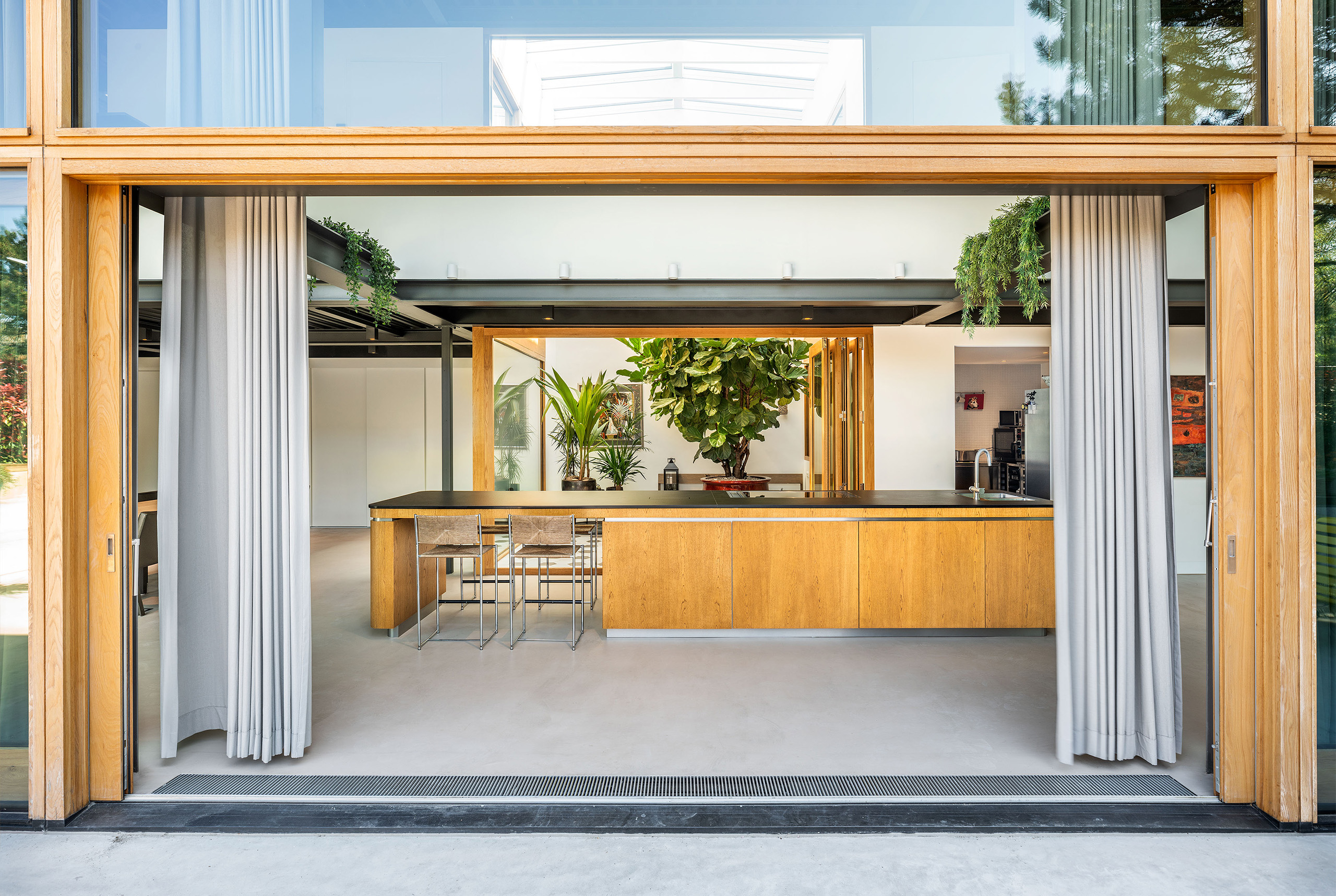 New facade with wooden window frames